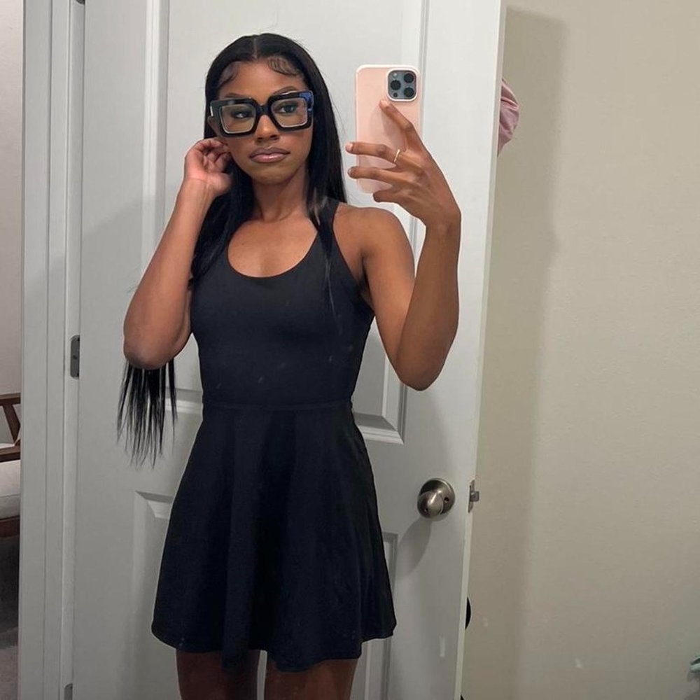 Amazing tennis style black mini dress